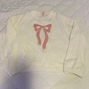 Cream Sweater with Pink Bow Design